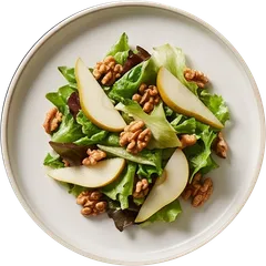 Casino de Charlevoix, set as a plate of green salad with pear and walnuts